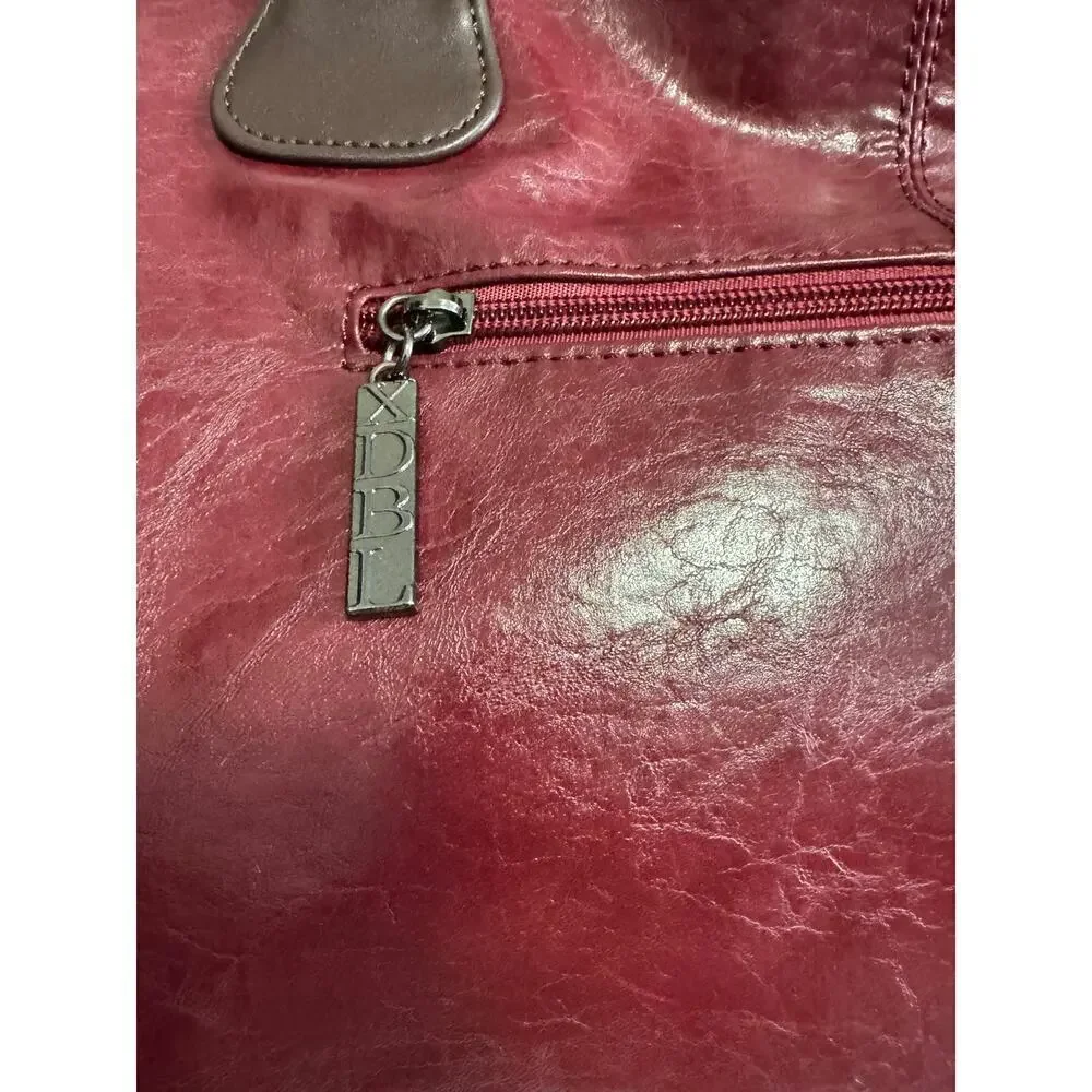 Xidibaola (XDBL) wine colored HOBO should bag an international company pebble